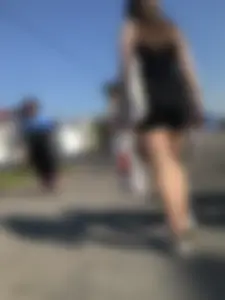Nice Girl in Black Shorts And Sneakers Street Candid Gallery