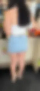 Sexy white girl in mini skirt beautiful legs