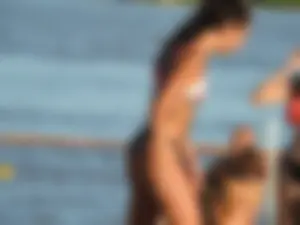Fit girl with nice body in thong bikini on the beach