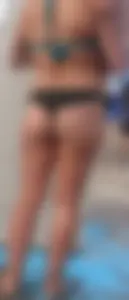 Beach shower milf in semi thong bikini with a nice ass