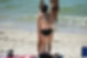 Sexy ass girl with a perfect body in her bikini on the beach