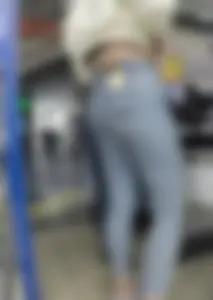 Two hot milfs in tight blue jeans standing at the cash register at the supermarket, awesome big butts