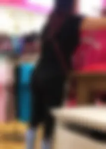 Mature sexy lady in Pink leggings shopping at Pink