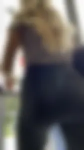Blonde College Girl In Leggings Girl Keeps Touching Her Booty