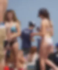 Group of sexy girls on the beach in bikinis with nice bodies