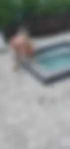 Jacuzzi girl with a nice ass in semi thong bikini and some cleavage