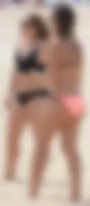 Girl in peach bikini on the beach with a great body and great ass