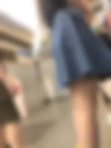 Candid Subway Girl in a Denim Skirt - Standing on Platform And Sitting in the Train With Crossed Legs Touching Her Knee