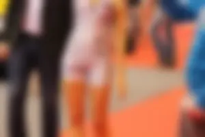 Car show models in spandex short suits with cleavage and camel toe