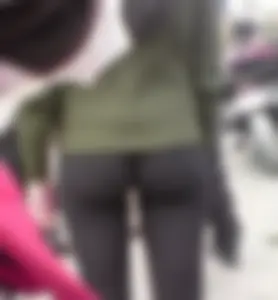 Perfect Ass in Toga Pants Closeup on the City Street