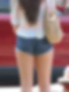 Denim short babe with a wedgie showing some cheeks