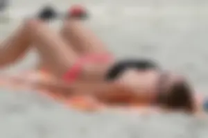 Candid Girl With Hot Legs in Swimsuit Pulling Down Her Panties on a Beach And  Photos