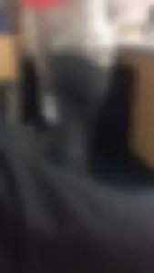 Girl In Pants Standing With Crossed Legs Booty Closeup