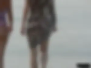 Bunch of sexy babes at the beach in thong bikinis