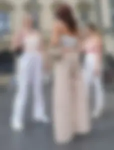 Long blonde braless in a white outfit (many pictures)