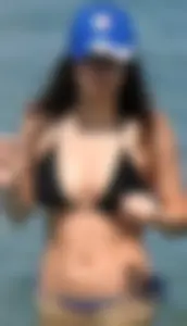 Hot ass brunette on the beach in blue thong with amazing body