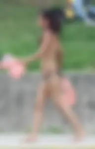 Sexy brunette milf in a bikini with a great body, nice ass and some camel toe