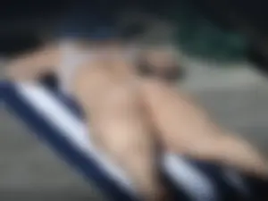 Sexy thick neighbor caught getting some sun in a little bikini showing of her chunky ass