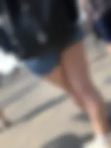 Muscular Legs And Butt in Denim Shorts - Street Creepshots Gallery on a Crosswalk