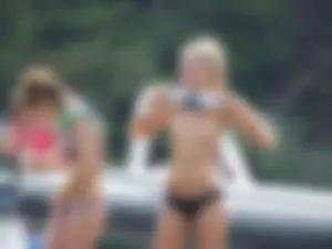 Young and skinny candid girl flashing her small boobs while changing into her swimsuit
