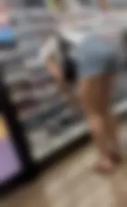 Babe with a  tight ass & long legs in Levi shorts