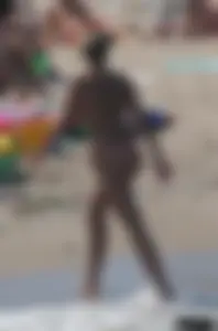 A bunch of sexy beach voyeur babes in bikinis, thongs and topless