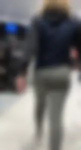 Sports store blonde worker in nice leggings