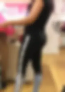 Mature sexy lady in Pink leggings shopping at Pink