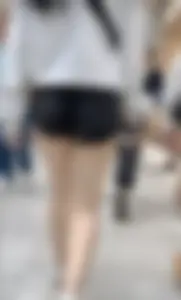 Asian girl in tight black shorts at the mall