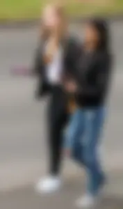 Redhead and ethnic skinny teens in tight jeans