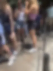 Hot girls in line on a hot day