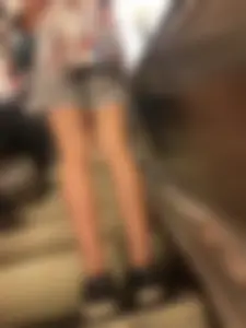 Skinny Female Legs on a Subway Escalator Closeup Creepshots
