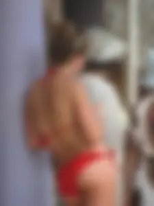 Sexy girl with a nice ass in a red bikini
