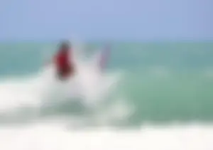 Candid surfers in bikinis