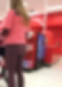 Target milf with a decent ass in maroon leggings
