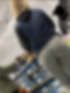 Sports store blonde worker in nice leggings