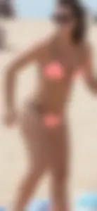 Girl in peach bikini on the beach with a great body and great ass