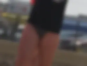 A group of teens in bikinis on the beach