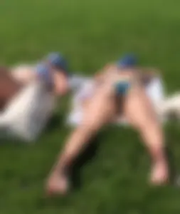 Two nice sunbathers with nice asses