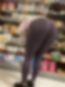Fit milf doing big bends/squats