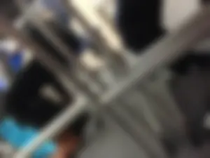 Legs in Yoga Pants Under Desk Candid