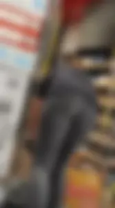 Slim clerk in tight grey jeans