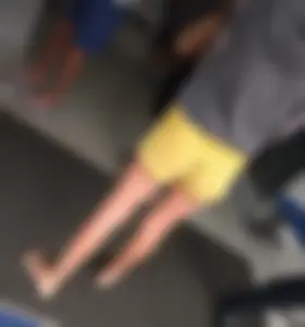 Skinny ass eating her yellow shorts