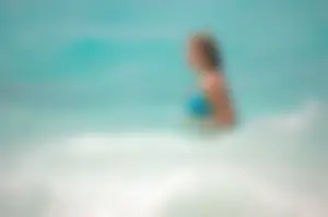 Assortment of sexy babes at the beach in bikinis