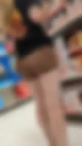 Cute petite bubble blonde hair in short brown spandex. OC