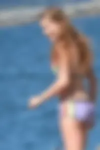Beauty at the beach in booty short bikini