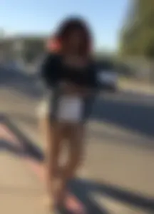 Big boobed redhead walking with no shoes and in shorts