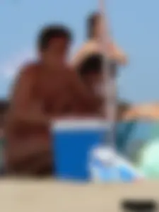 2 topless thonged sexy friends on the beach with great bodies