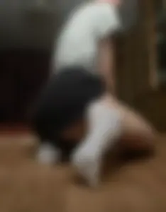 Hot Girl in a Short Skirt And White Socks Standing on One Knee on the Floor Home Selfie