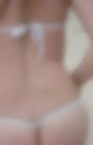 Micro thong blonde on the beach with pokies and camel toe